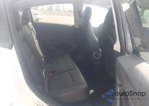 2023 Tesla Model Y Awd/Long Range Dual Motor All-Wheel Drive z USA, uszkodzony, nr VIN 7SAYGDEE9PA097396